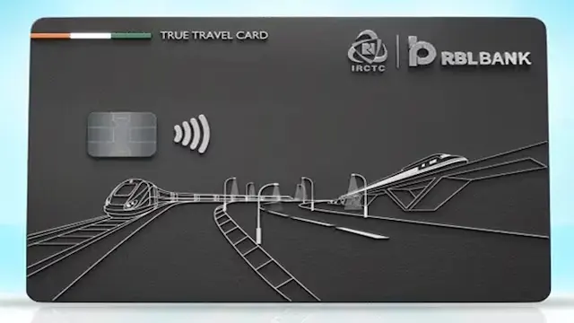 The IRCTC RBL Bank Credit Card caters to regular train users, rewarding expenditures related to rail travel. With a joining and renewal fee of ₹500, the card offers a welcome benefit of 500 reward points. Users earn five points for every ₹200 spent on IRCTC bookings via the website or Rail Connect app. It also provides rewards on FASTag recharges, NCMC reloading, UTS transactions, and IRCTC’s flight, hotel, and cruise bookings. Cardholders can benefit from a 1% transaction fee waiver on IRCTC bookings and up to eight complimentary visits to selected IRCTC lounges annually, along with train cancellation protection of up to ₹5,000.