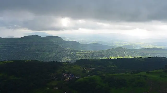 10. Rajmachi – A Favourite For Monsoon Treks | Just 80 km from Mumbai, Rajmachi becomes vibrant and picturesque during the monsoon. It is a favorite among trekkers and also draws travelers hoping to experience the waterfalls, valleys, and stunning Sahyadris' landscapes. (Image: Wikimedia Commons)