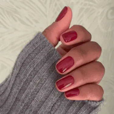 Short nails with cherry red polish