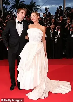 Pictured: Jennifer Lawrence at Robert Pattinson at Cannes Film Festival 2025