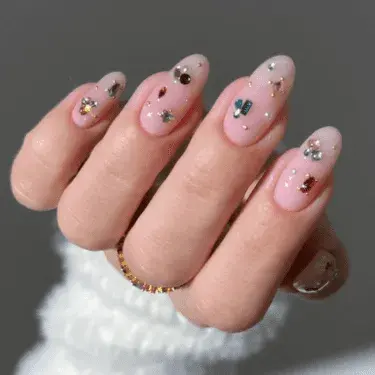 Natural nails with gemstones design
