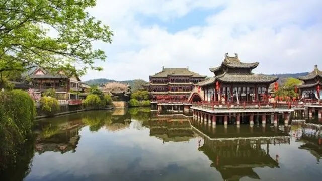 Zhejiang, China: As one of China's oldest water towns, Zhejiang is famous for its well-preserved ancient edifices and charming stone bridges. The city's canals meander through historic buildings, offering gondola-style rides beneath arched structures. This picturesque destination is a popular day trip from Shanghai, captivating visitors with its tranquility and charm.