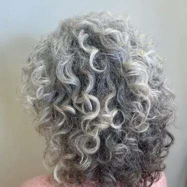 Curly gray haircut
