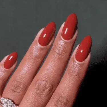 Almond nails with brick red polish