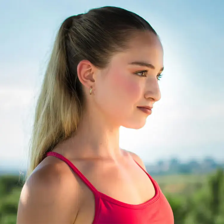 Girl with slick-back ponytail
