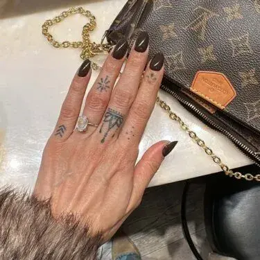 Manicure with dark brown, espresso polish
