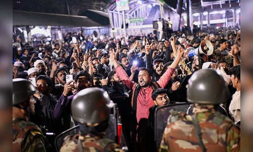 India restarts visa services in Dhaka; operations halted at two other centers due to protests.