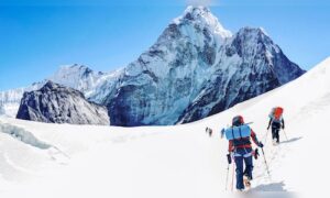 Everest climbing season begins later than usual, as climbers remain unfazed by massive ice block and high travel expenses.